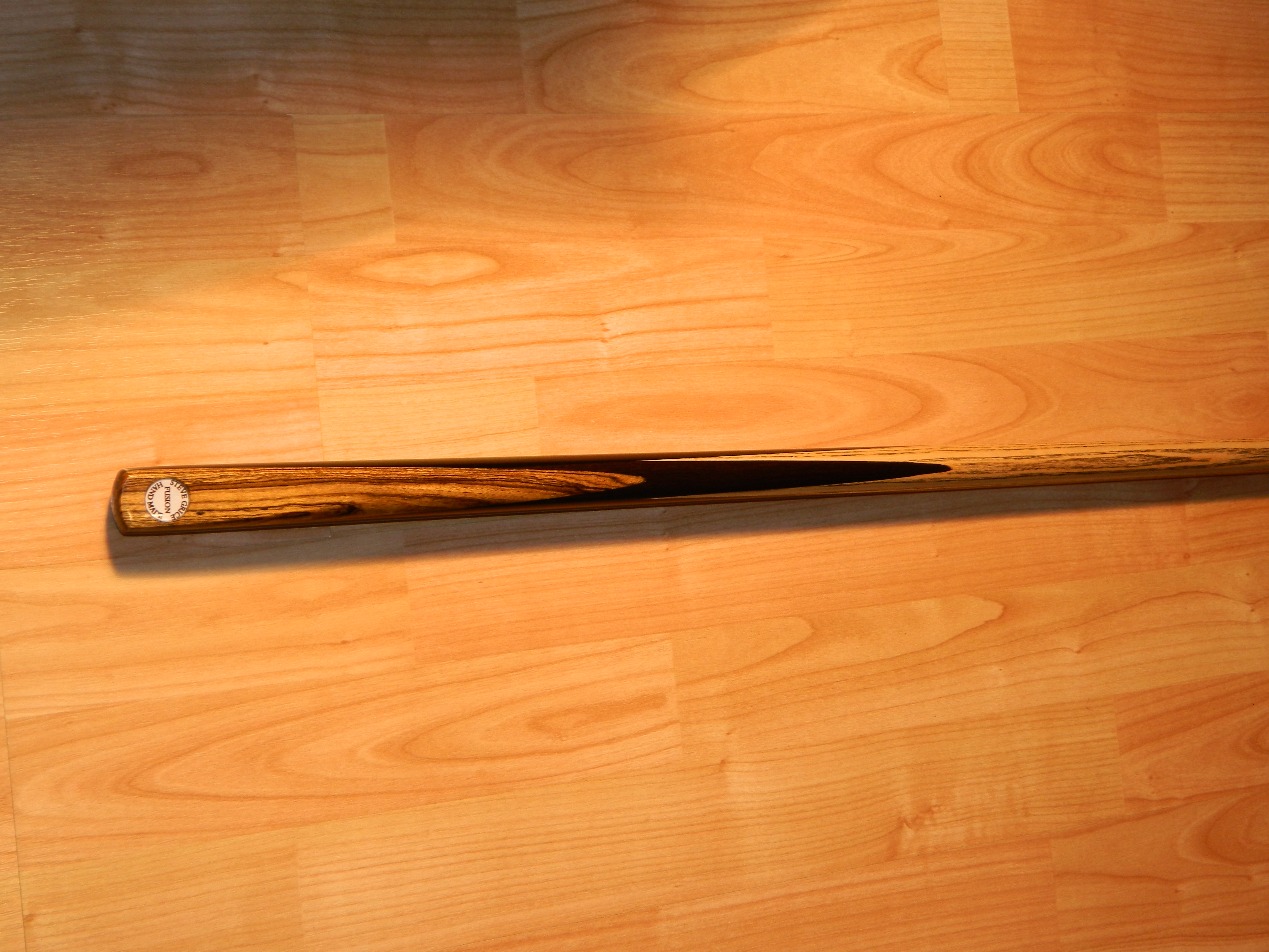  Steve Grice Fusion  cue an exotic front wedge  on a hand spliced ebony butt.